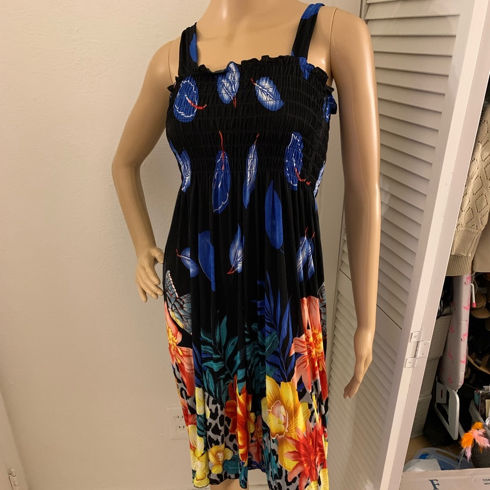 Knee length sun dress. Size small/medium lightweight material. Blue with detail